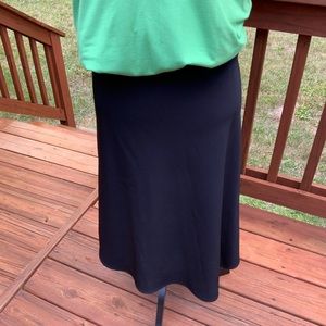 NWOT White House Black Market side zippered below knee skirt.